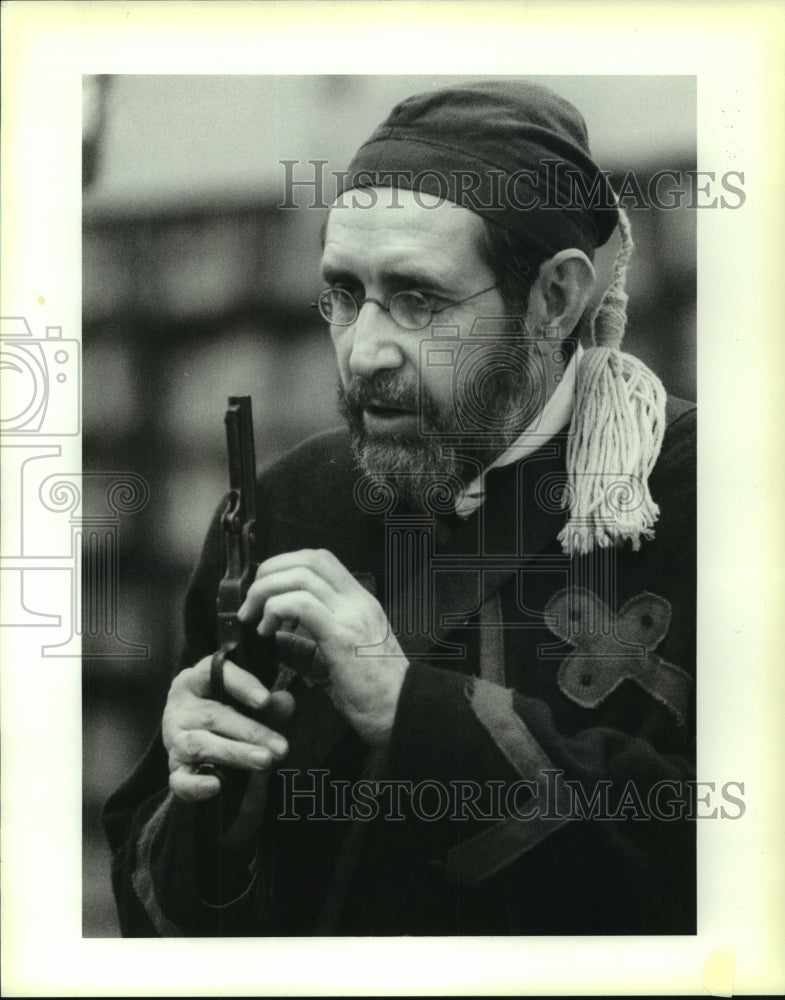 1990 Press Photo Larry Euritt Holding a Gun- Historic Images