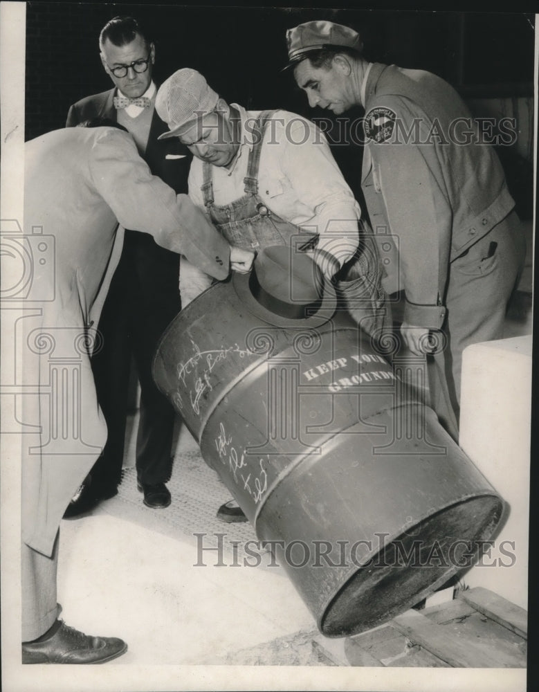 Load image into Gallery viewer, 1957 Press Photo People looking in barrel at East Jefferson High School, N.O.
