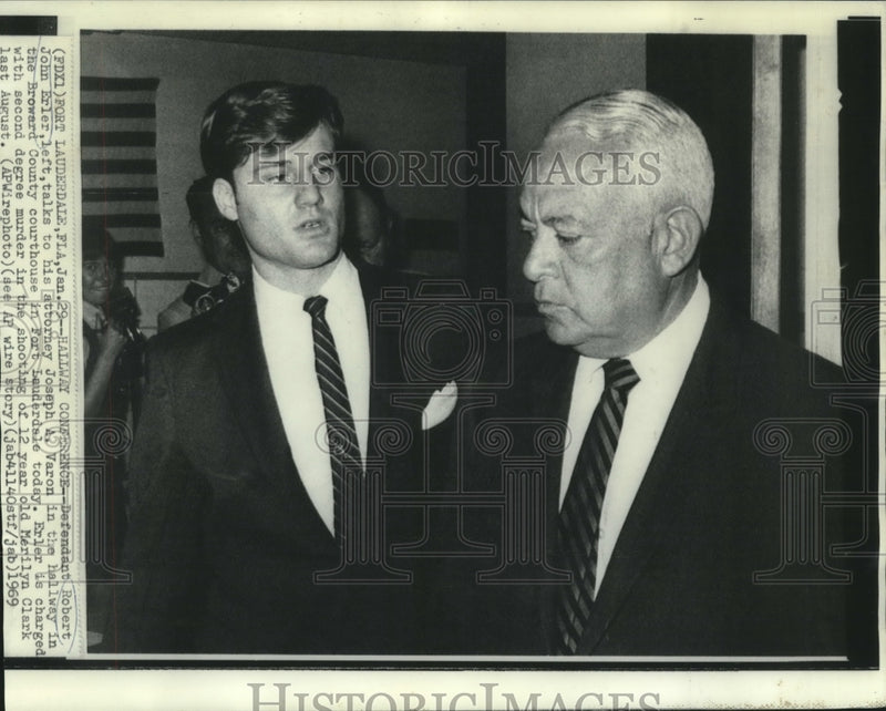 Load image into Gallery viewer, 1969 Press Photo Defendant Robert Erler with his attorney Joseph A. Varon
