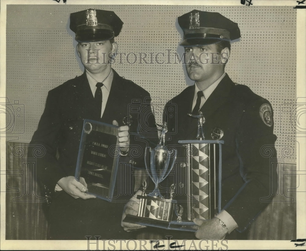 1969 Press Photo Awards were made to John E. Driscoll and Timothy A. Frederick