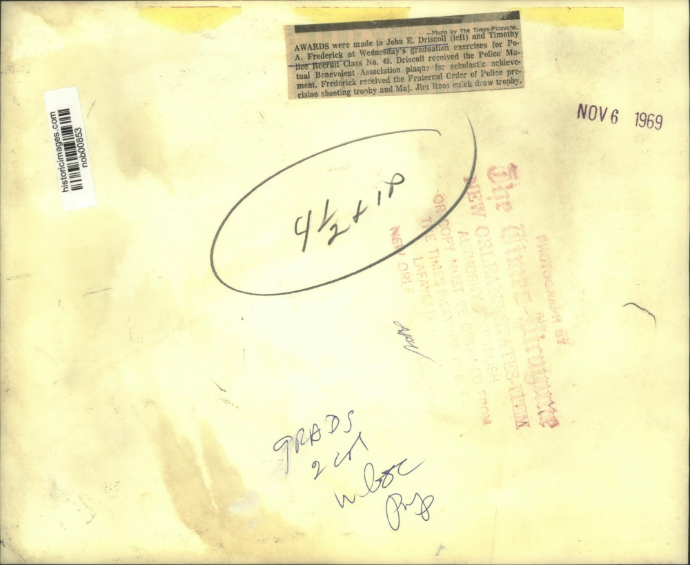 1969 Press Photo Awards were made to John E. Driscoll and Timothy A. Frederick