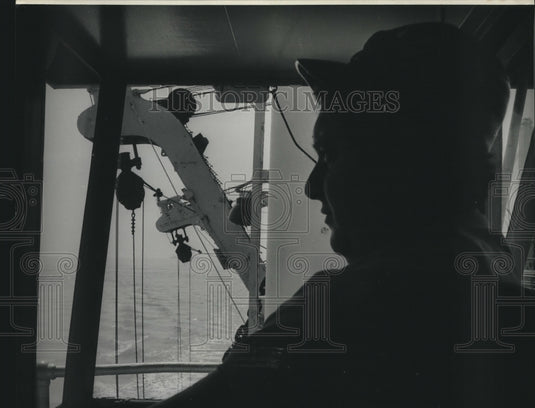 1974 Press Photo Man Looks Out Window of Ship - nob02461