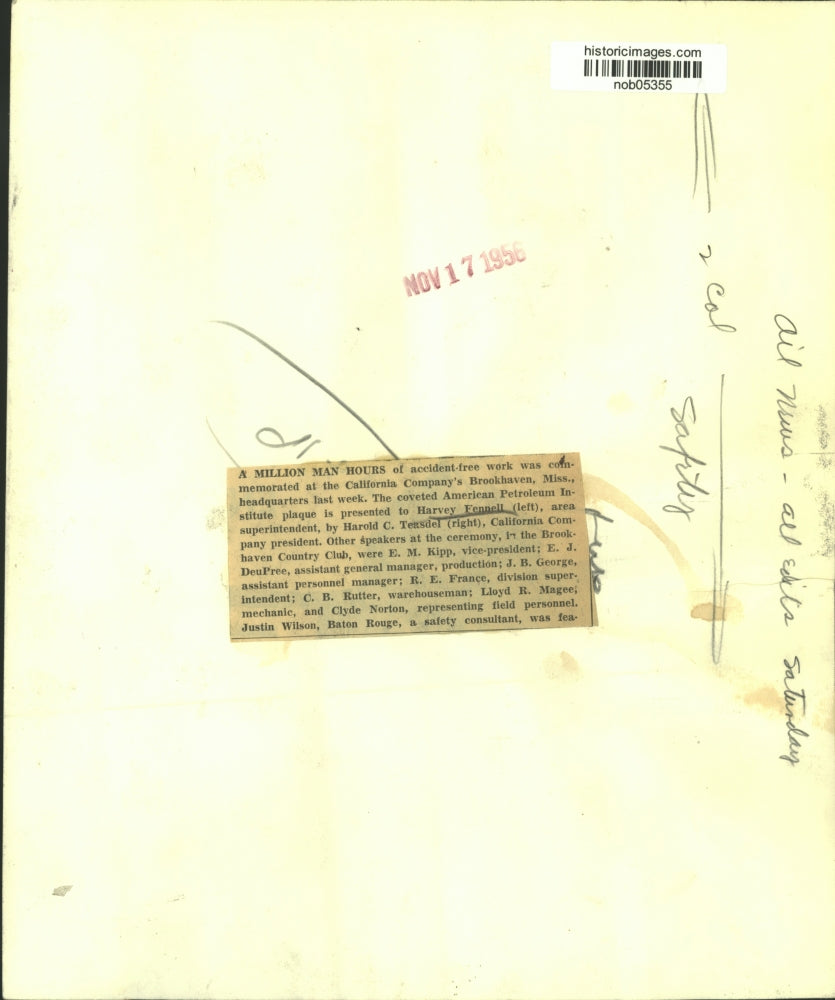 1956 Press Photo Harold Teasdel presents Petroleum plaque to Harvey Fennell