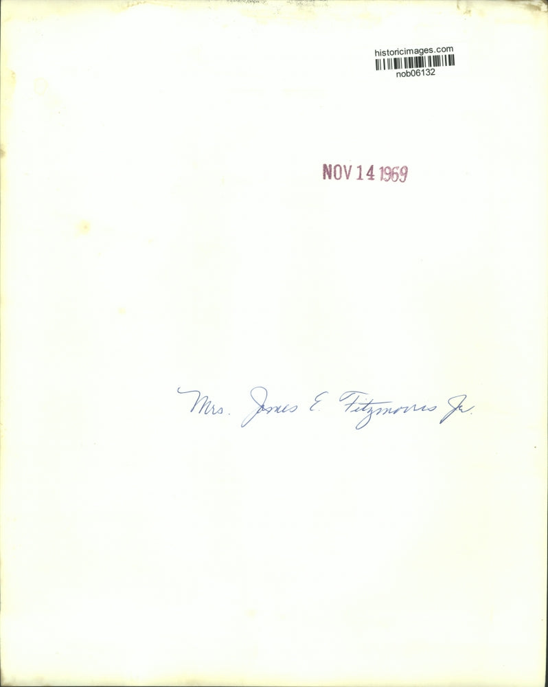 1969 Press Photo Mrs. James Fitzmorris, Jr. stands in front of husband's picture