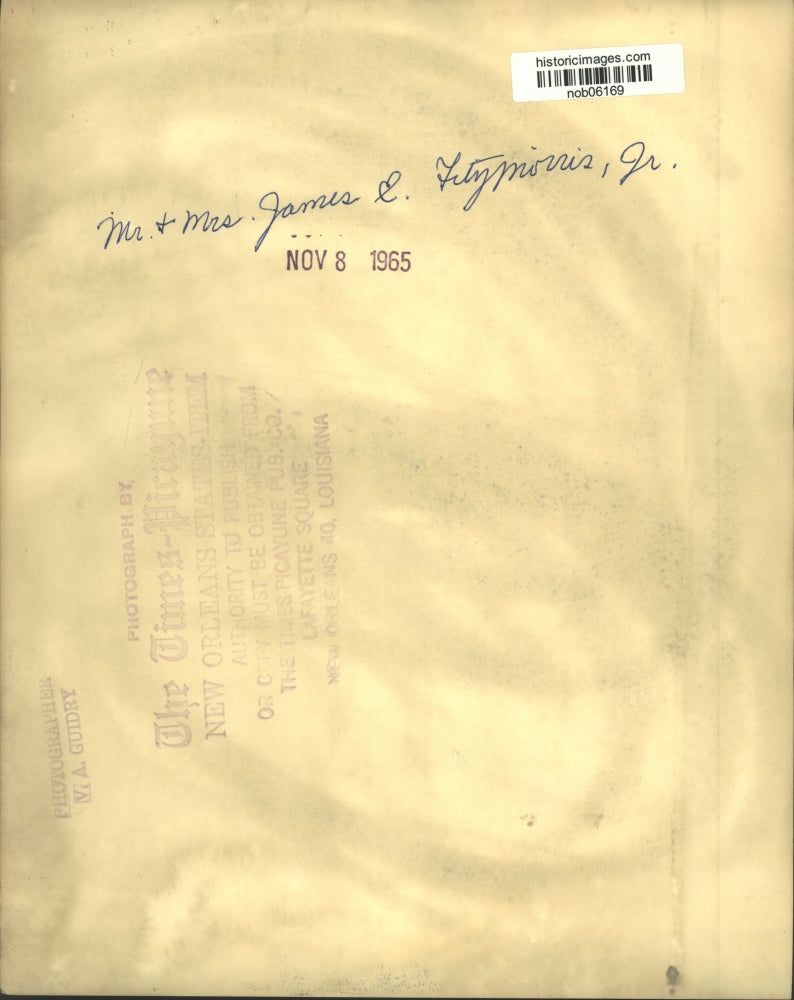 1965 Press Photo Mr. and Mrs. James E. Fitzmorris, Jr. in his office.