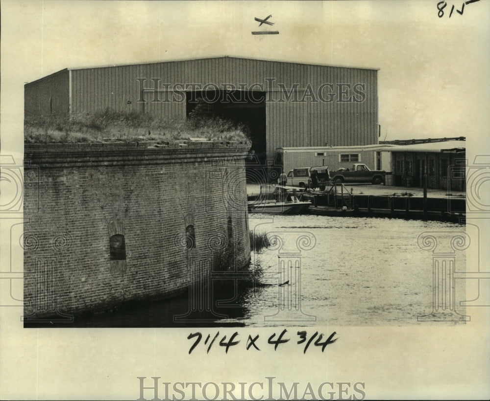  Press Photo Boat Shed stands alongside historic Fort Macomb.- Historic Images