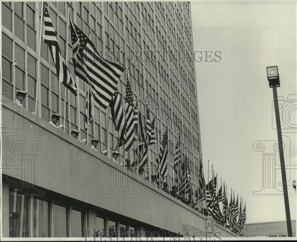1975 Press Photo Hundreds of American Flag raised during Flag Day - nob06960