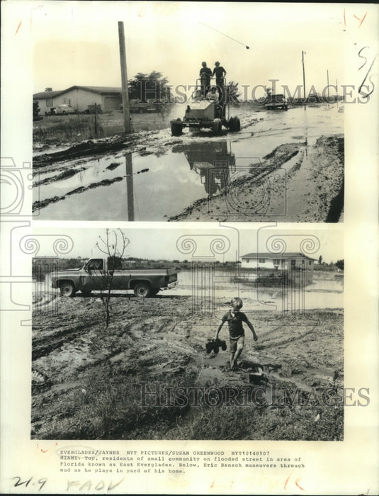 1981 Press Photo Family drives through mud & Eric Bensch plays, East Everglades- Historic Images