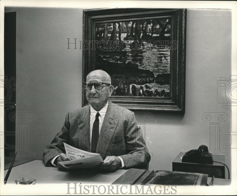 1961 Press Photo Crawford H. Ellis at work in his office - nob08414