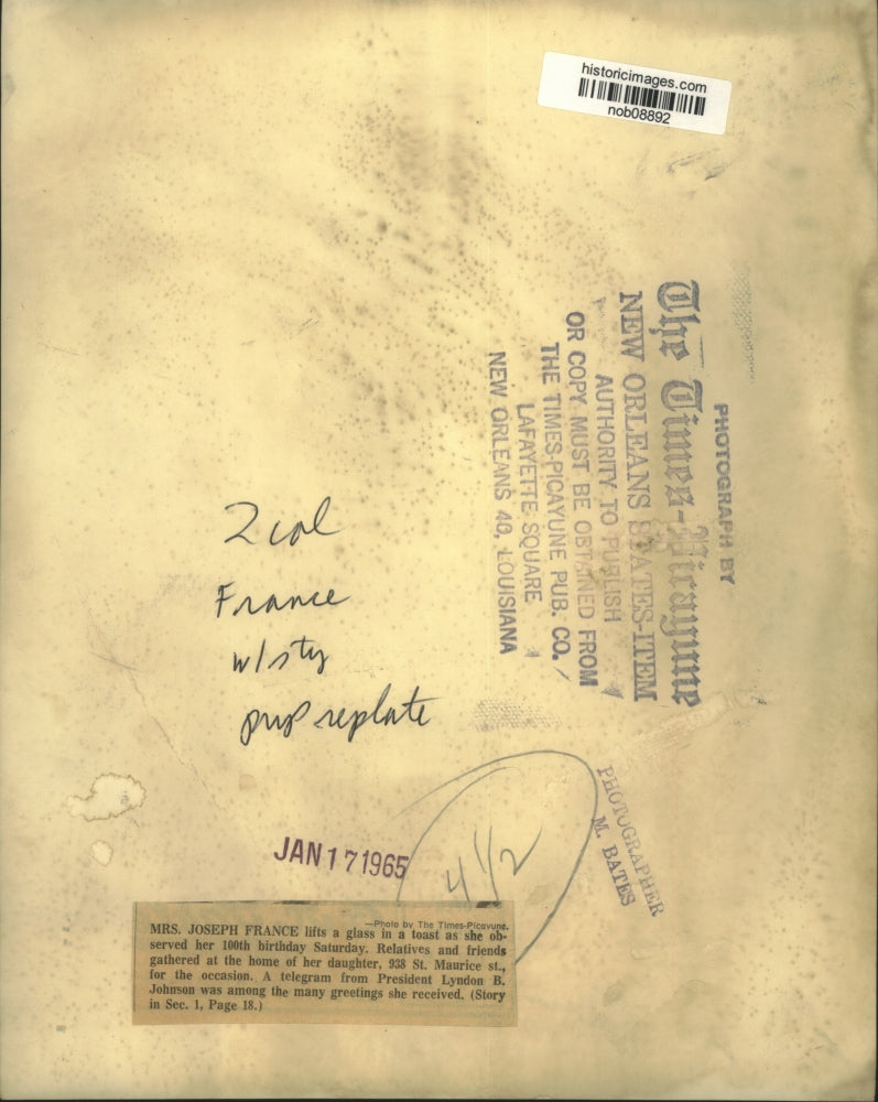 1965 Press Photo Mrs. Joseph France celebrates 100 birthday with a toast