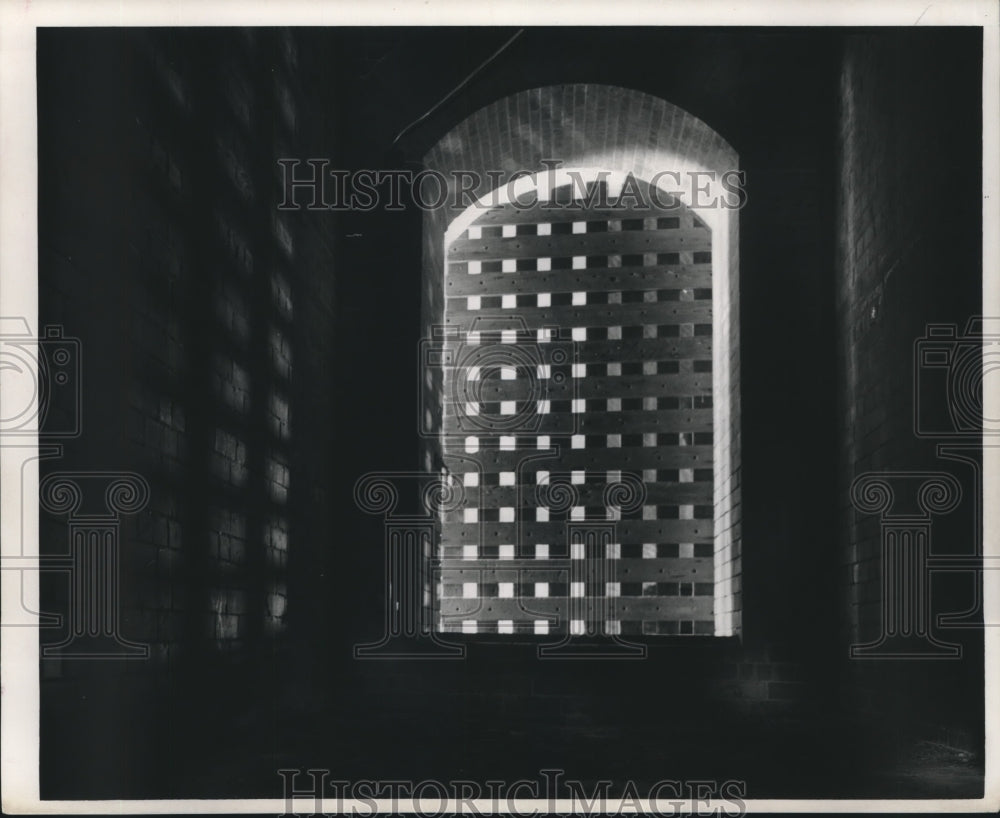 1966 Press Photo Wooden lattice across doorway of cell in fort - nob09610