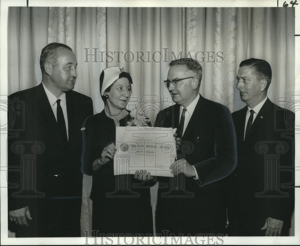 1966 Press Photo Dorthy Ferguson presented Bronze medal for outstanding service.
