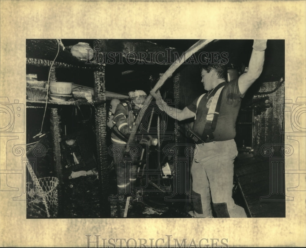  Press Photo Firemen investigating the scene of a charred home- Historic Images