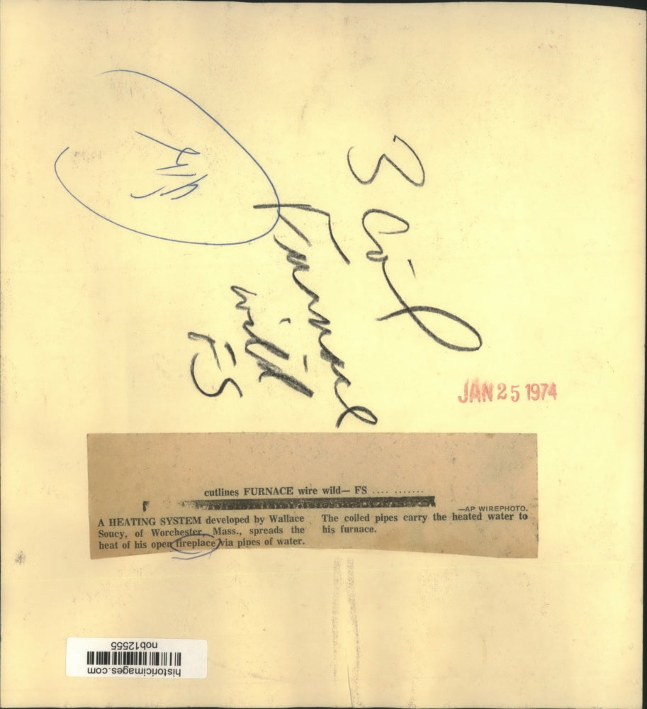 1974 Press Photo Wallace Soucy shows his fireplace heating system. - nob12555