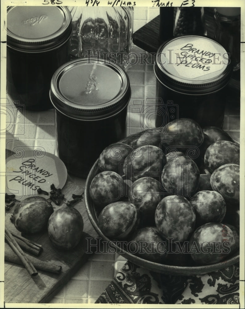 Load image into Gallery viewer, 1979 Press Photo Brandy Spiced Plums. Add brandy and let the magic happen.
