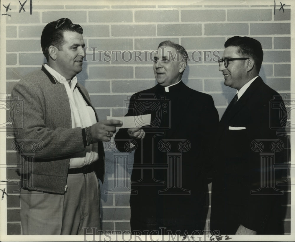 1960 Press Photo Pastor receives check for Immaculata High School improvements- Historic Images