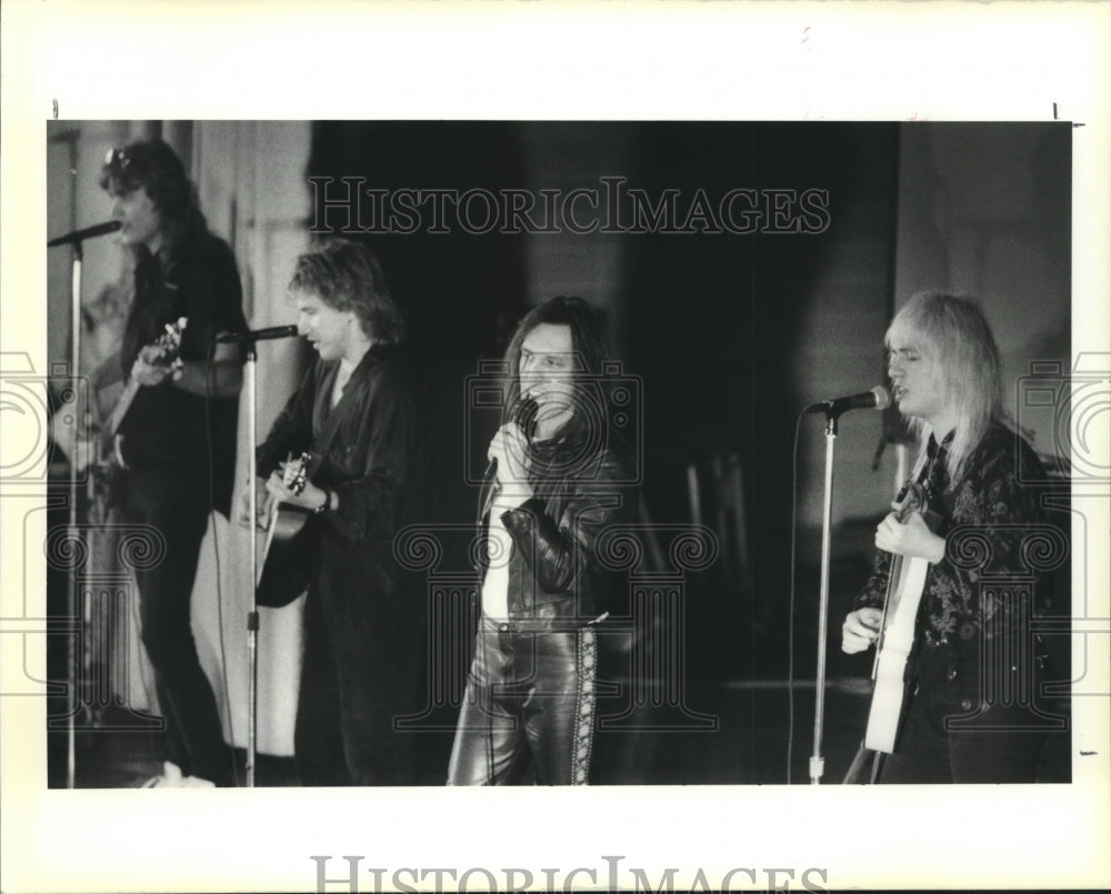 1990 Press Photo Gorky Park sings on stage at Chalmette High School - Historic Images