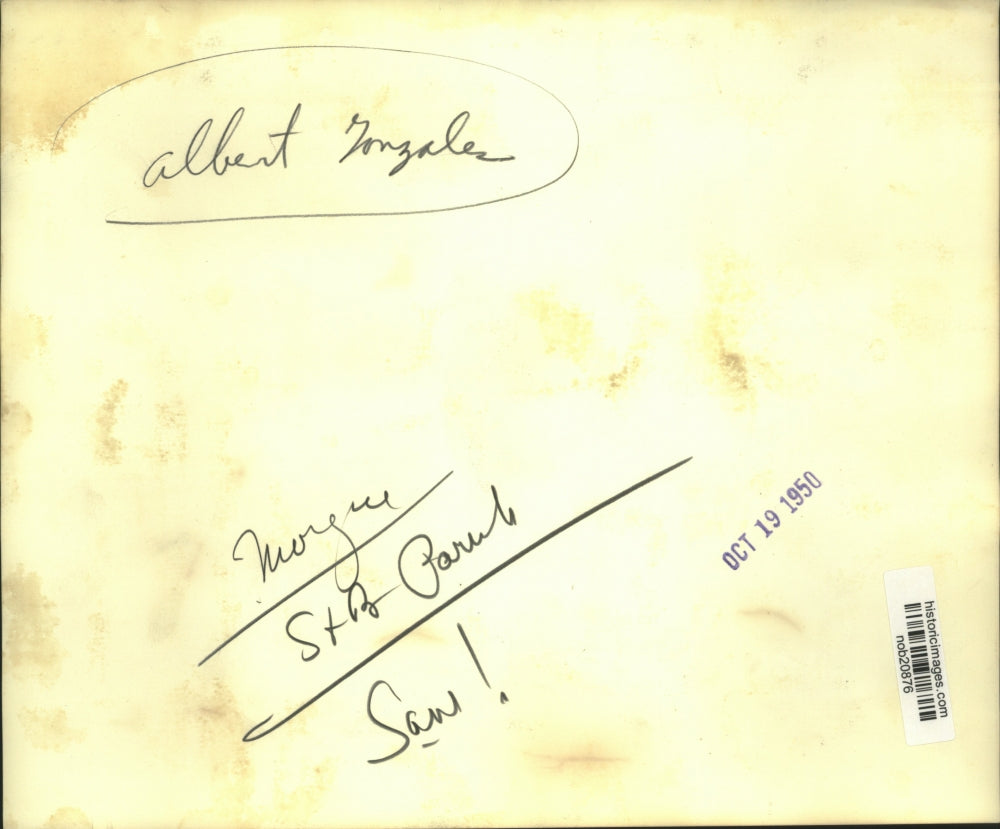 1950 Press Photo Albert Gonzales joking around with a woman - nob20876