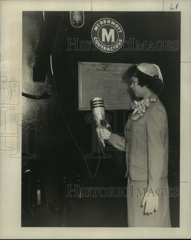 Load image into Gallery viewer, 1953 Press Photo Carolyn Graves christens new derrick barge at Avondale Marine
