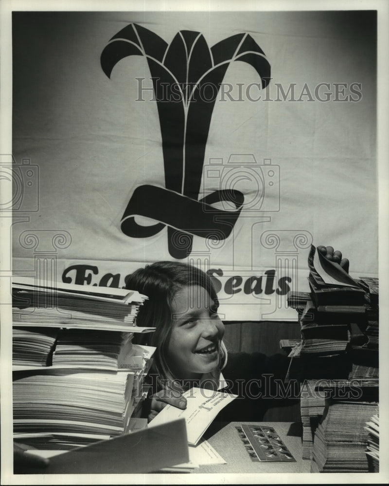 Load image into Gallery viewer, 1969 Press Photo Girl Scout Linda Young is preparing a mailing for Easter Seals.
