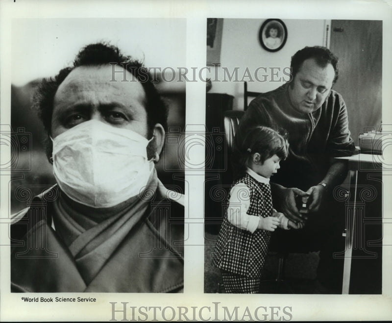 Load image into Gallery viewer, 1970 Press Photo An unidentified man taking care of his daughter - nob25670
