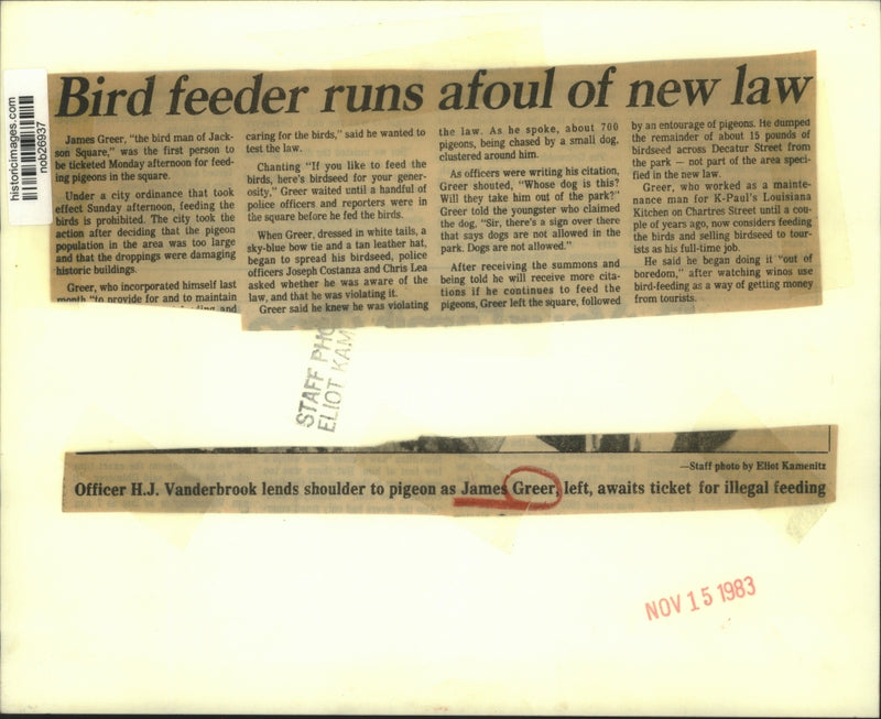 Load image into Gallery viewer, 1983 Press Photo Officer H.J. Vanderbrook with bird feeder James Greet
