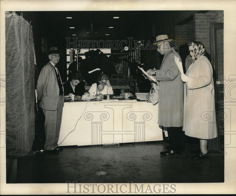 Load image into Gallery viewer, 1964 Press Photo Citizens prepare to cast their votes during an election
