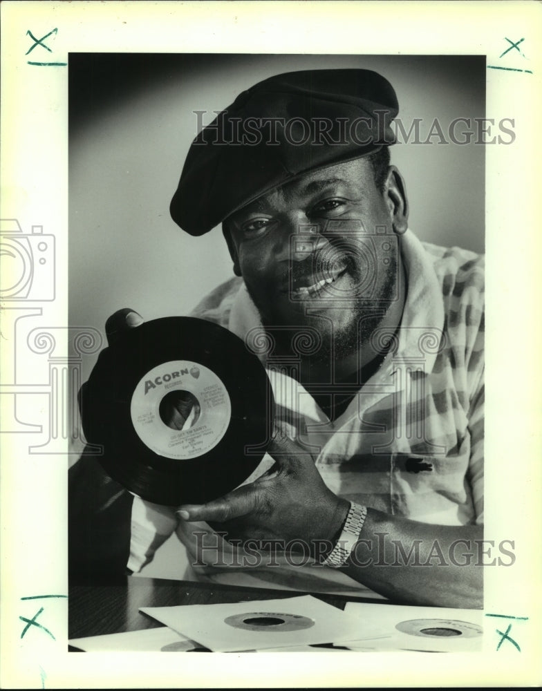 1989 Press Photo Clarence Henry with a copy of his new song Go Get &#39;Em Saints- Historic Images