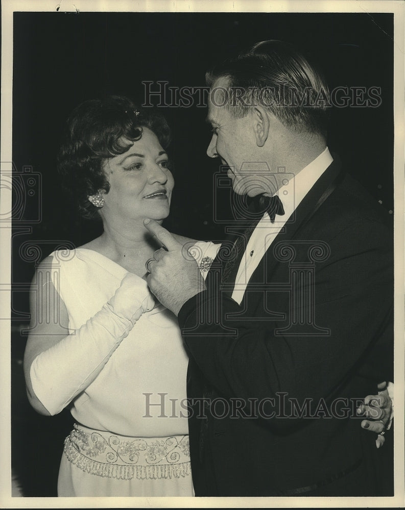 Load image into Gallery viewer, 1965 Press Photo Mrs. Edward Hebert dancing with Kenneth Belleu- Mardi Gras Ball
