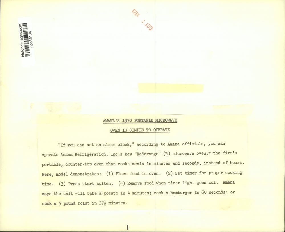 1973 Press Photo A model demonstrates the new Radarange microwave oven by Amana