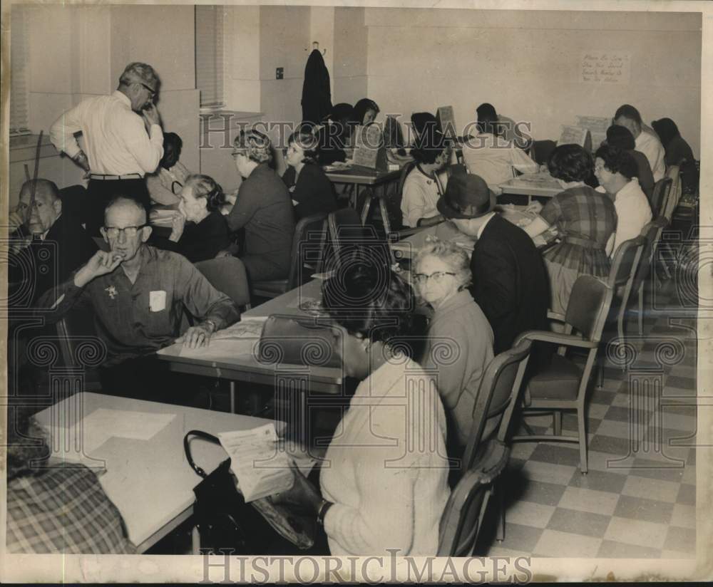 1966 Press Photo Taxpayers filing income tax returns at Internal Revenue Office