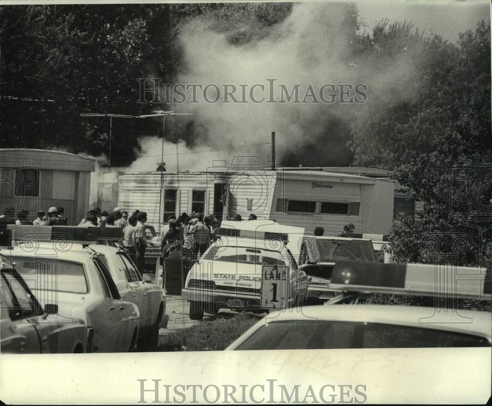 1975 Press Photo Fire Caused by Police Tear Gas Canister Engulfs Mobile Home