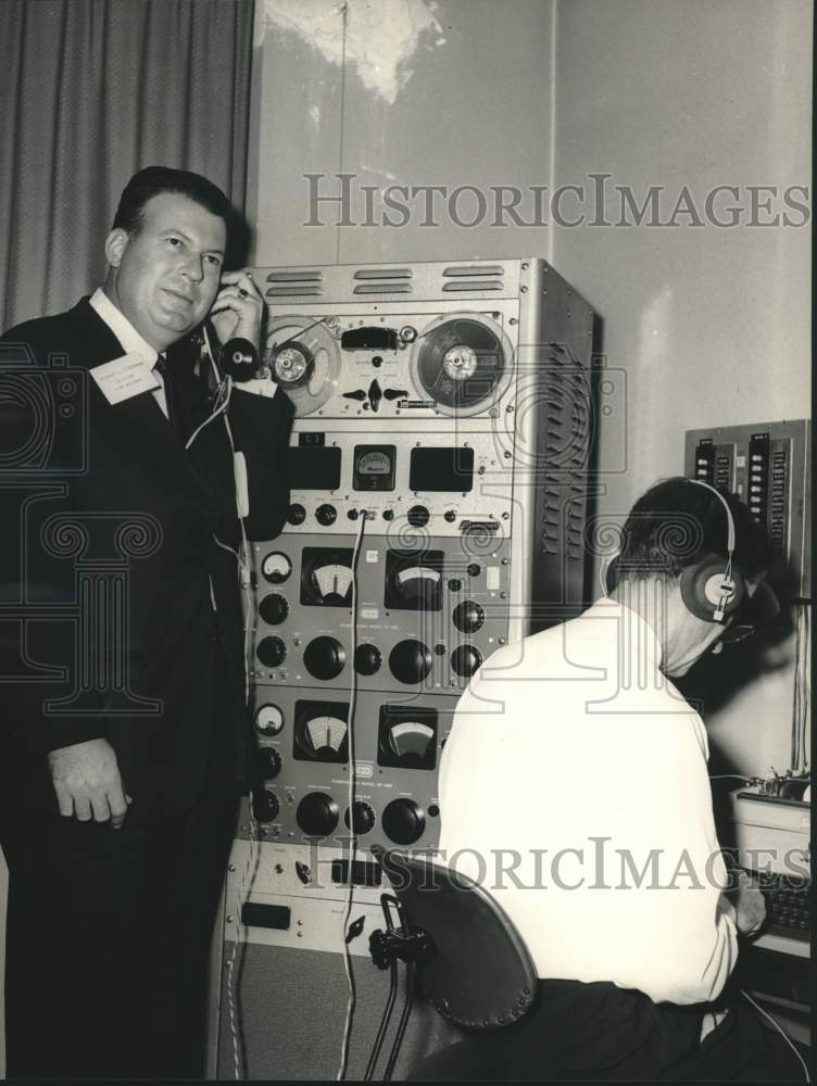 Load image into Gallery viewer, 1963 Press Photo Richard L. Hinderman monitors a Communist broadcast on radio
