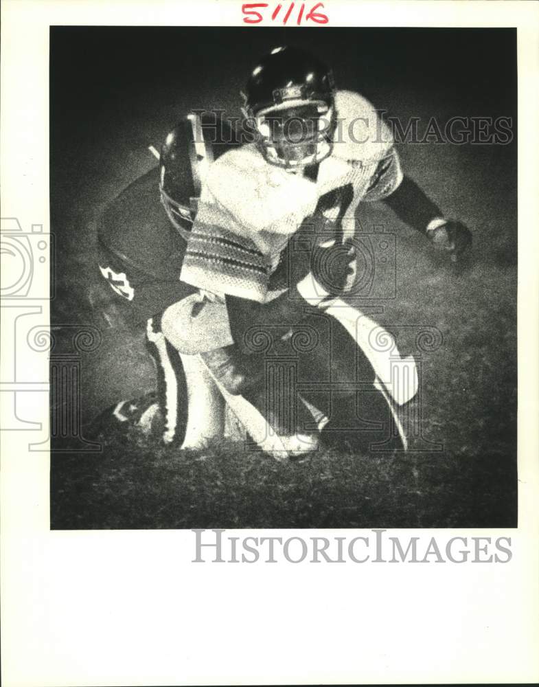 1985 Press Photo Quarterback Joseph Allen of O. Perry Waller High Goes Down- Historic Images