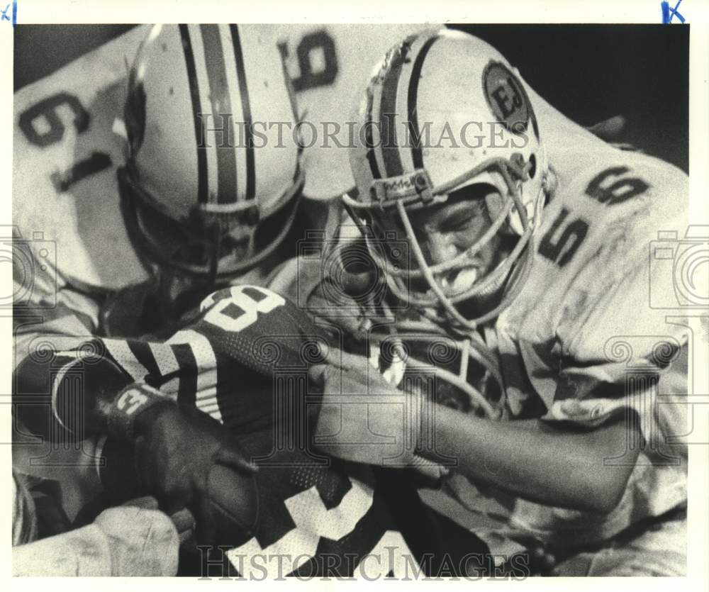 1984 Press Photo East Jefferson football players put a stop on West Jefferson- Historic Images