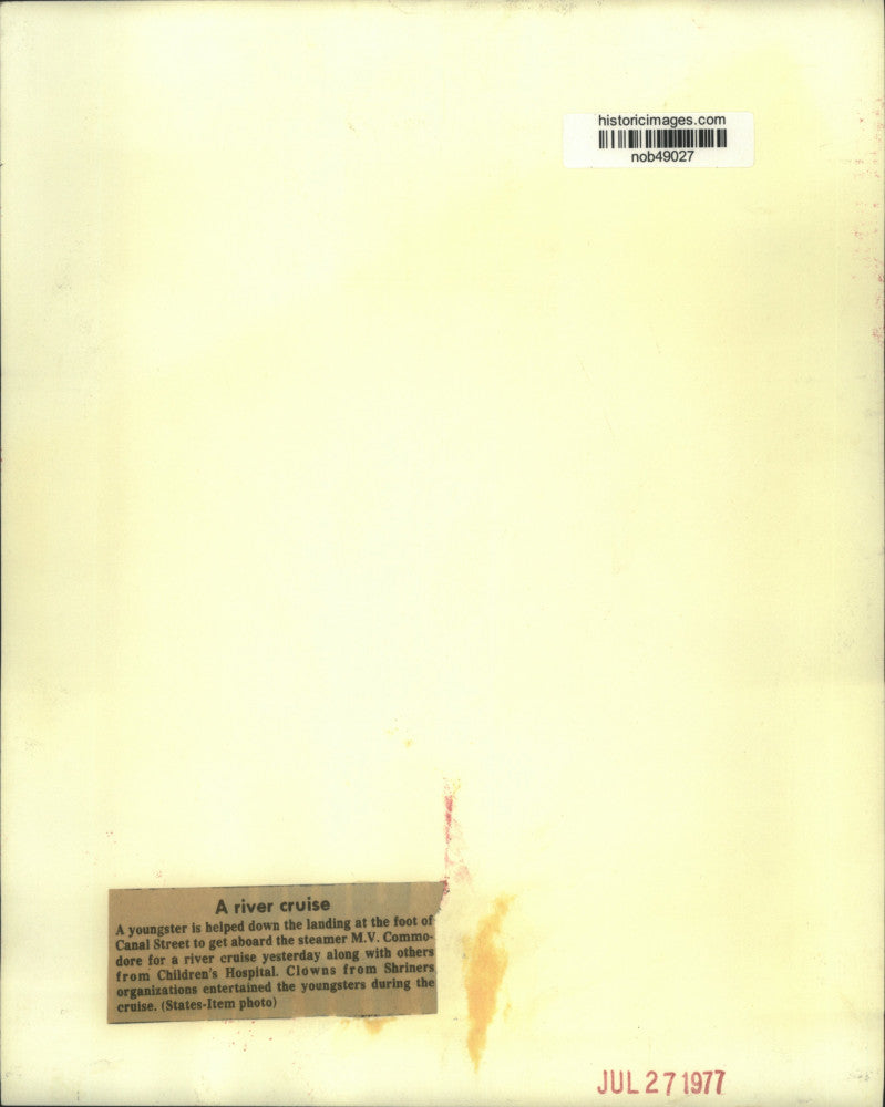 1977 Press Photo Youngster gets help at Canal Street to get aboard MV Commodore