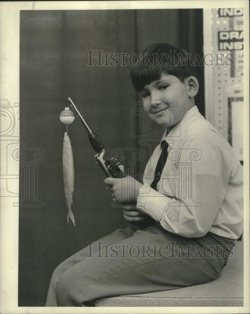 Load image into Gallery viewer, 1966 Press Photo Anglers can carry closed telescoping rod in pocket or briefcase
