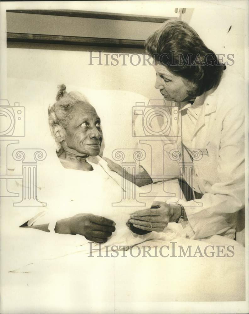 Load image into Gallery viewer, 1973 Press Photo Sarah Jackson seen here with Mrs. Mabel Bohne, head nurse.

