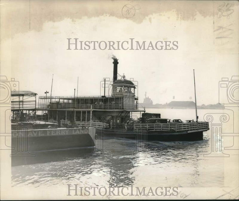 Load image into Gallery viewer, 1953 Press Photo Loaded to the gunwales, the Jackson Ferry pushes off
