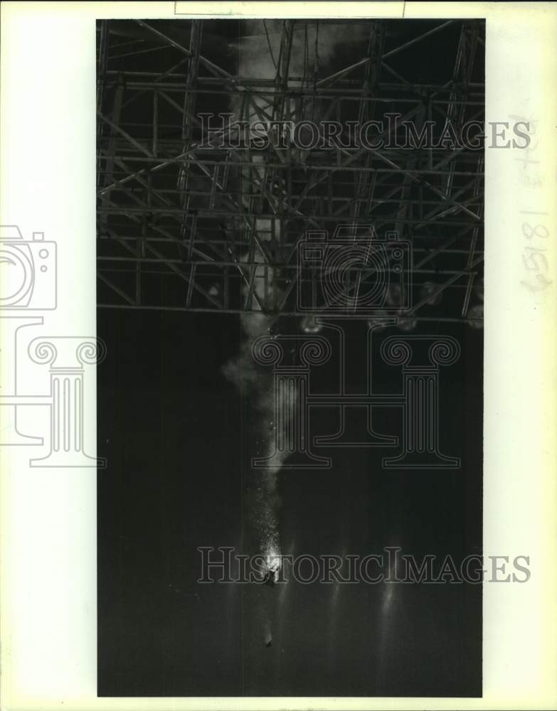 1991 Press Photo Fire falling from rafters at Louisiana Superdome halftime show.