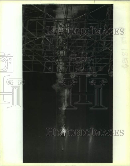 1991 Press Photo Fire falling from rafters at Louisiana Superdome halftime show.