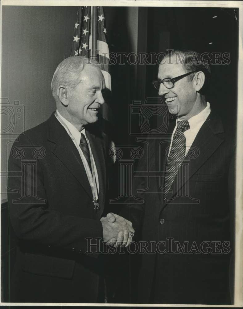 Load image into Gallery viewer, 1975 Press Photo General John M. Wright shaking hands with Floyd Lewis
