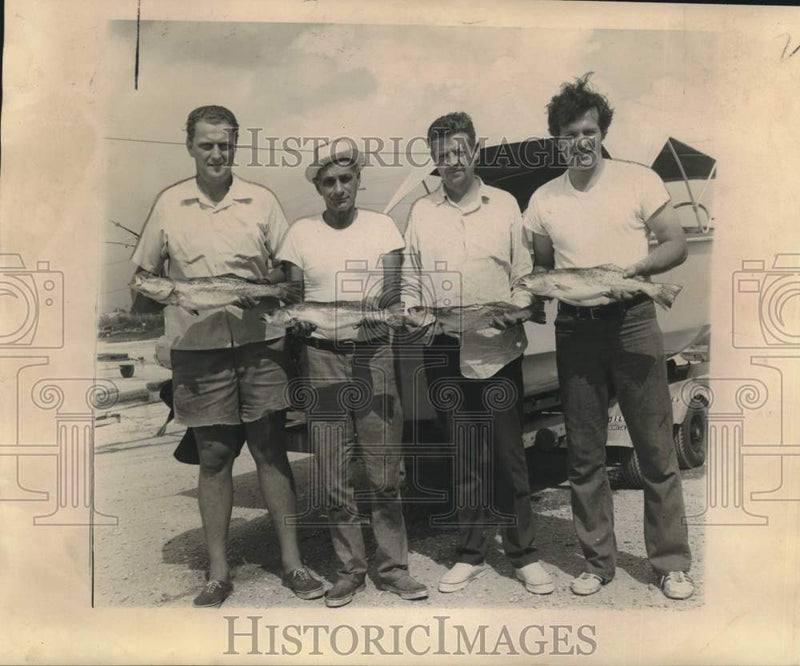 Load image into Gallery viewer, 1974 Press Photo Group with speckled trout caught at Sandy Point - nob59973
