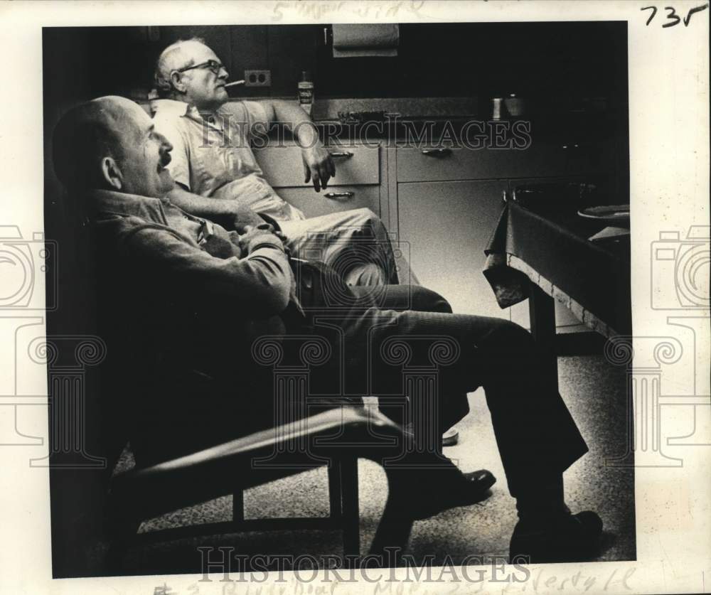 1978 Press Photo Chief engineer Red Faircloth joins the captain in the gallery
