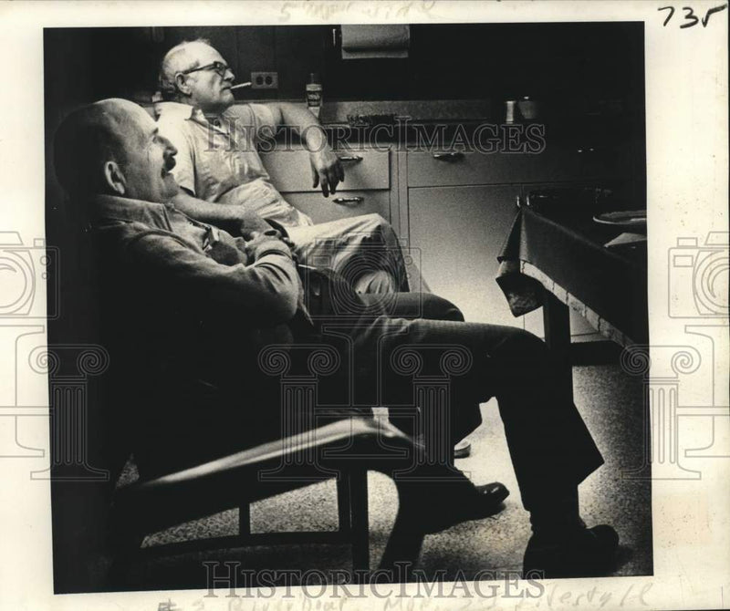 Load image into Gallery viewer, 1978 Press Photo Chief engineer Red Faircloth joins the captain in the gallery
