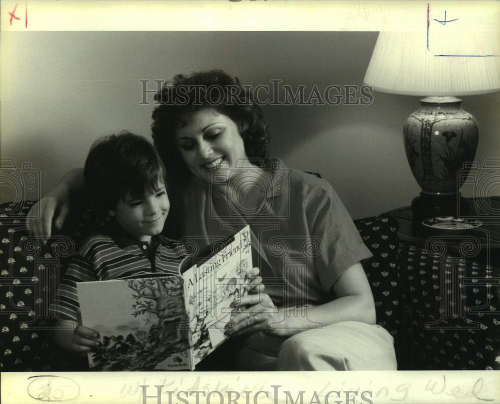 1966 Press Photo Mother And Son Enjoy KidSkills Book Together - Historic Images