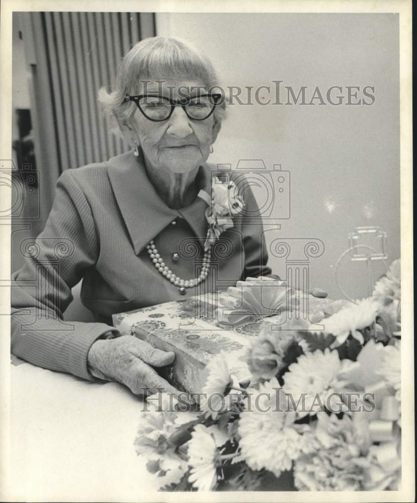 1974 Press Photo Stella Labarthe hold her gift - nob62406