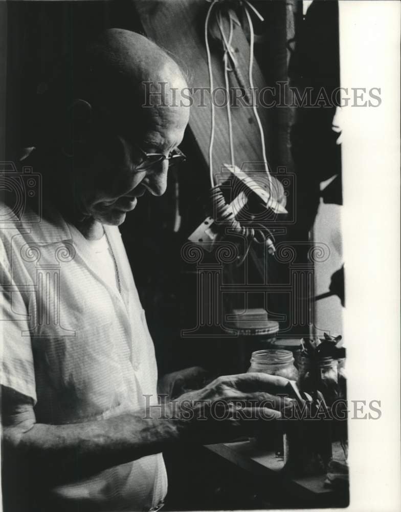 1974 Press Photo Wilfred Massicot in his workshop on his house in 9th Ward- Historic Images