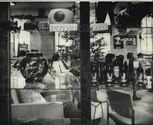 1975 Press Photo Ceramic & Wood Carving Displayed On Glass Shelves-New Orleans- Historic Images
