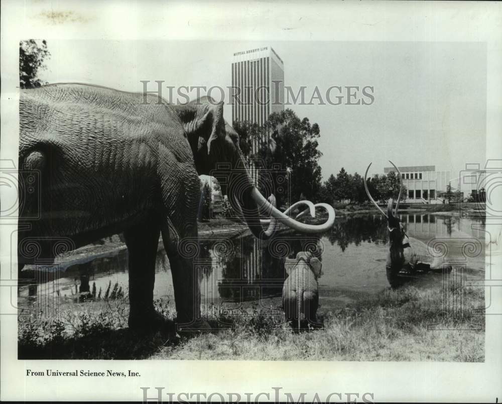 1970 Press Photo Cement replicas of prehistoric animals in Los Angeles Park Lake